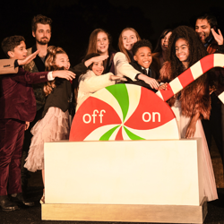 Cast members of "Christmas at Graceland: Home for the Holidays" flipped the switch on Graceland